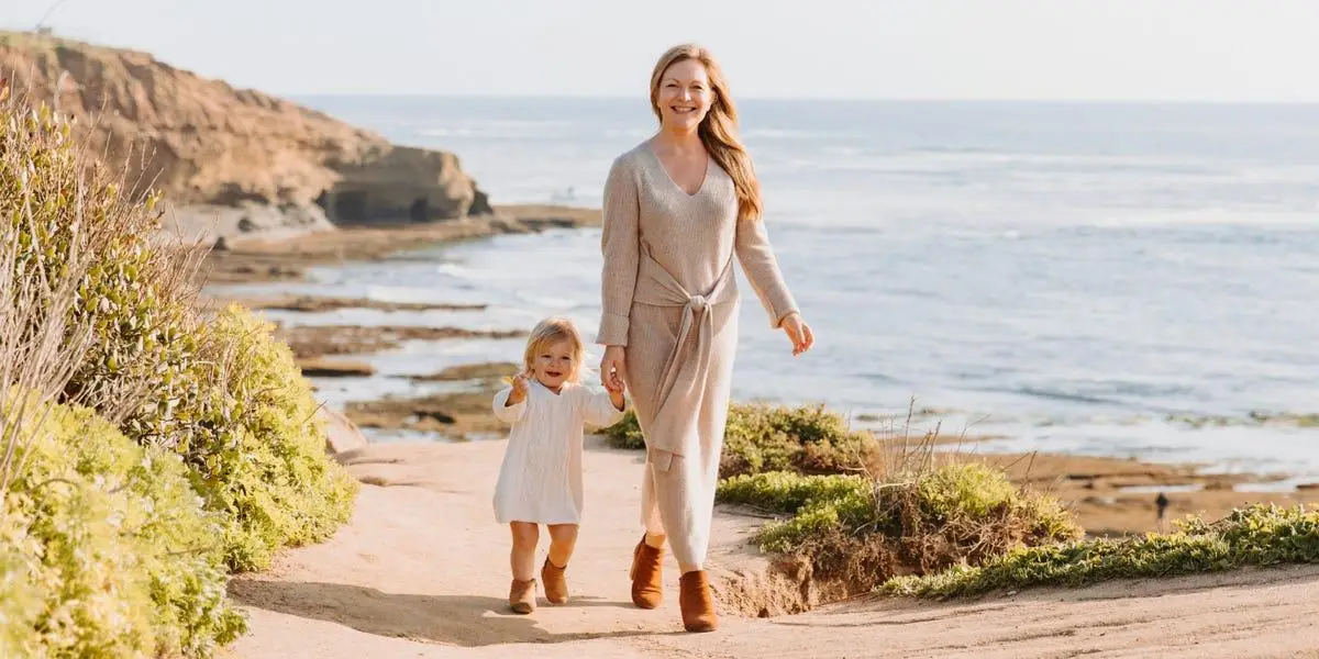 Mother and toddler walking